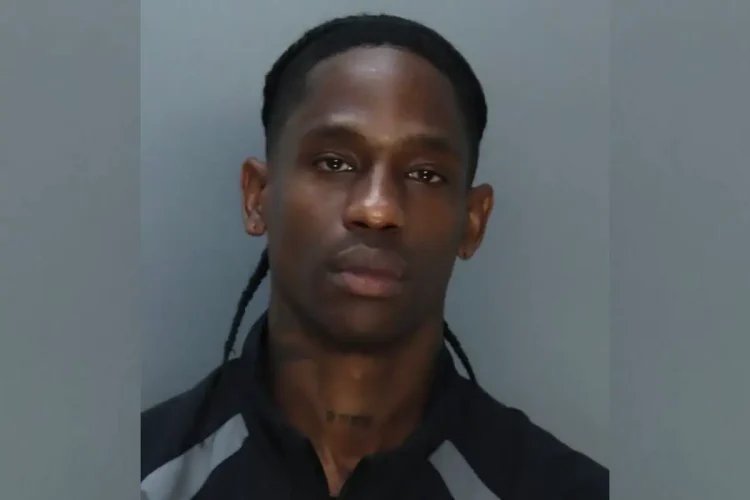 Travis Scott Exploits Arrest With "It's Miami" Mugshot Merch Travis Scott Exploits Arrest With “It’s Miami” Mugshot Merch