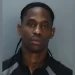 Travis Scott Exploits Arrest With “It’s Miami” Mugshot Merch