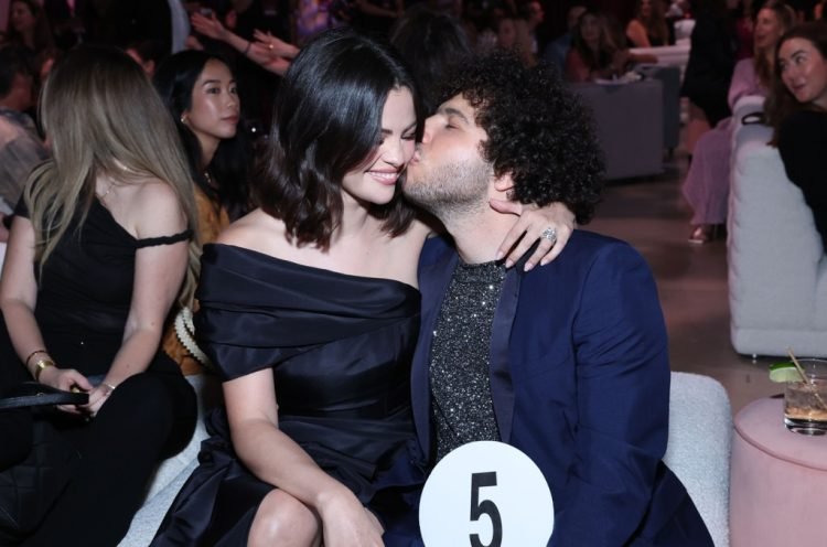 Selena Gomez Kisses Fiance Benny Blanco in Holiday Photo Selena Gomez Kisses Fiance Benny Blanco in Holiday Photo