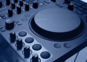 Why did inMusic lay off 100 employees from Native Instruments?