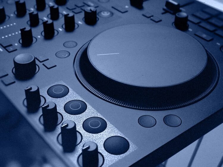Why did inMusic lay off 100 employees from Native Instruments?
